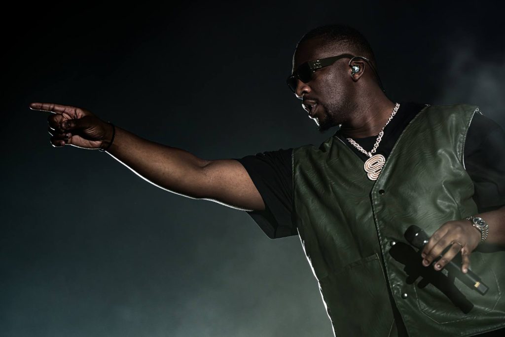 Artist SDM in concert at ING Arena against a black backdrop
